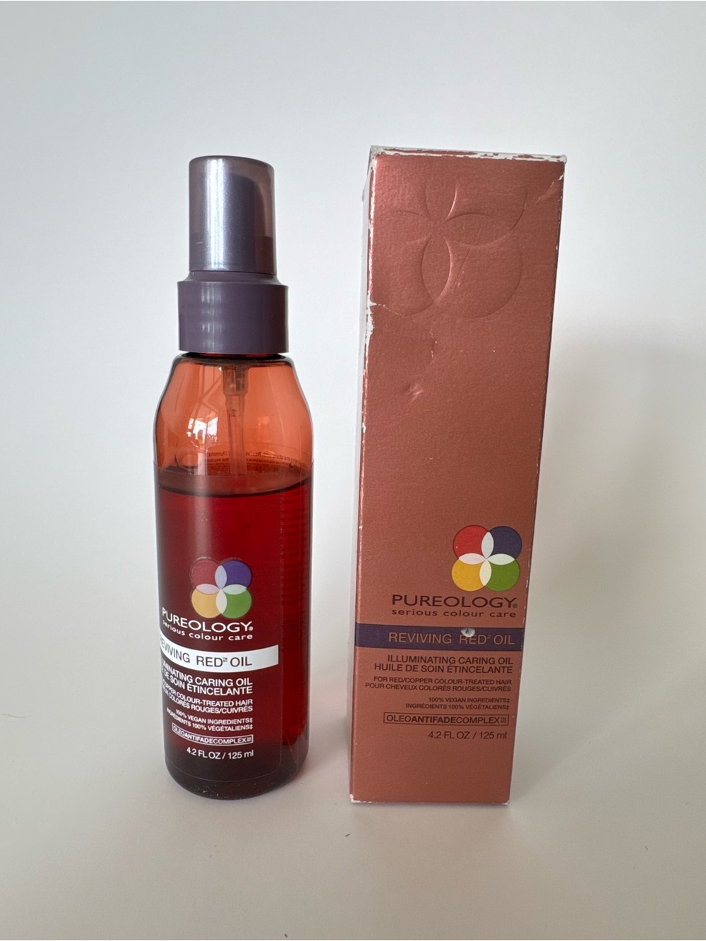 Pureology Reviving Red Oil — Red and Copper Bottle
